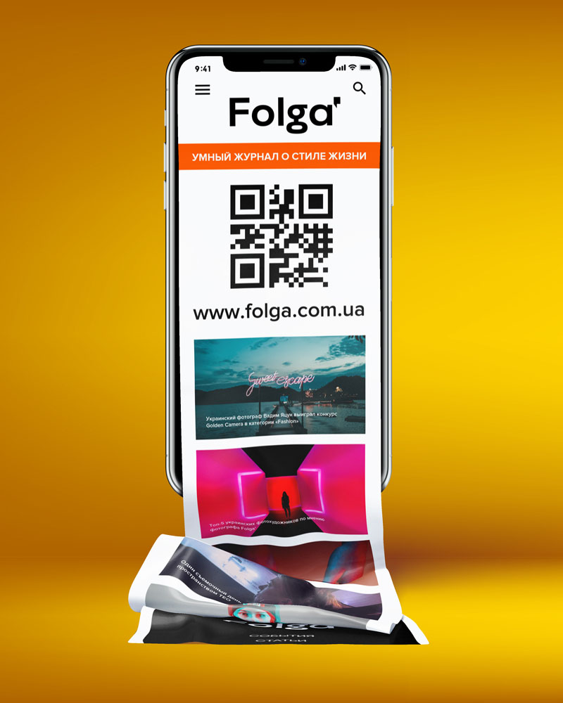 Смартфон с изображением главной страницы журнала Folga' Сайт Folga' в смартфоне